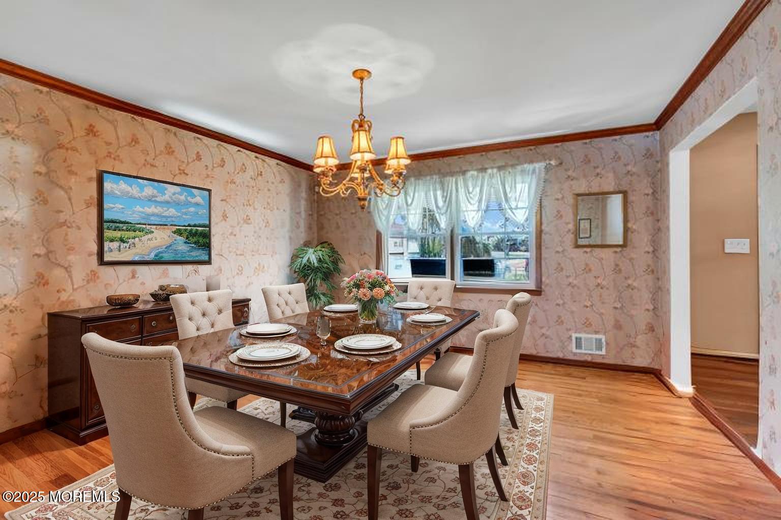 4 Koosman Drive Middletown, NJ 07737 - Photo 12 of 27 a view of a dining room with furniture wooden floor and chandelier