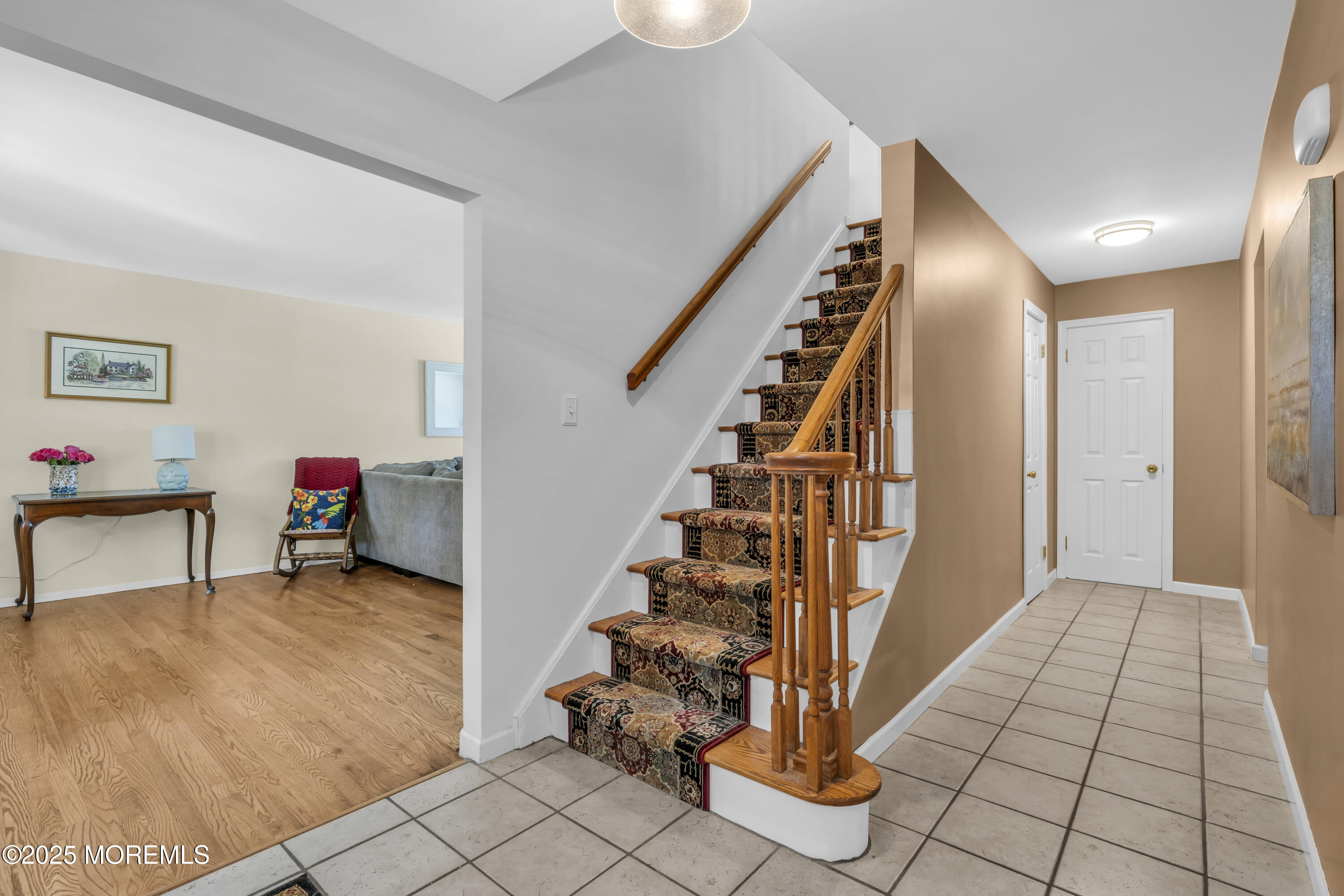 4 Koosman Drive Middletown, NJ 07737 - Photo 16 of 27 a view of entryway with stairs and furniture