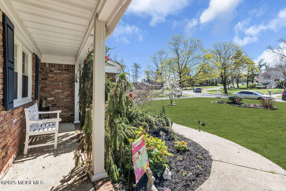 4 Koosman Drive Middletown, NJ 07737 - Photo 20 of 27 a view of a house with a garden