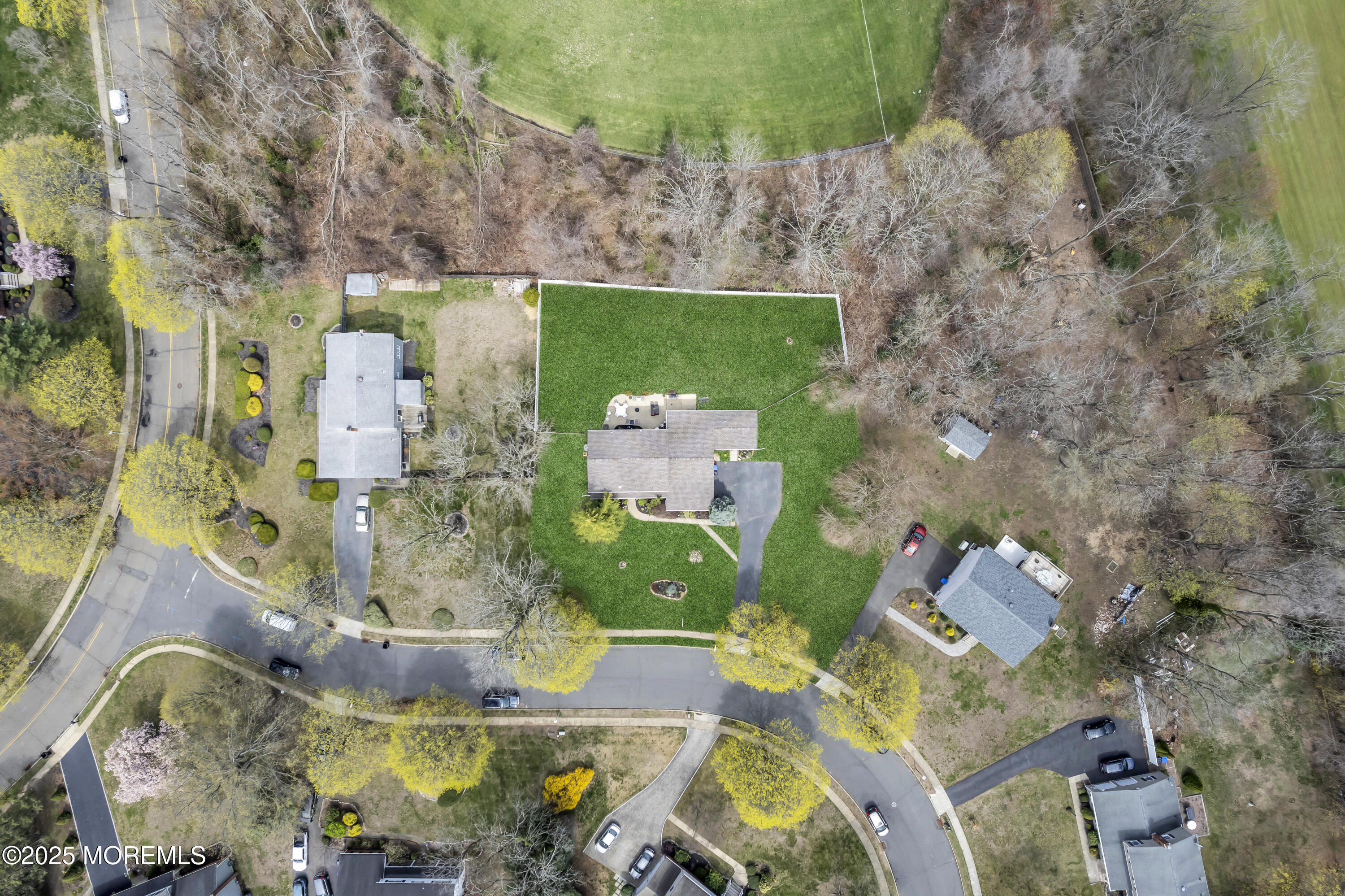 4 Koosman Drive Middletown, NJ 07737 - Photo 5 of 27 an aerial view of a house with a swimming pool