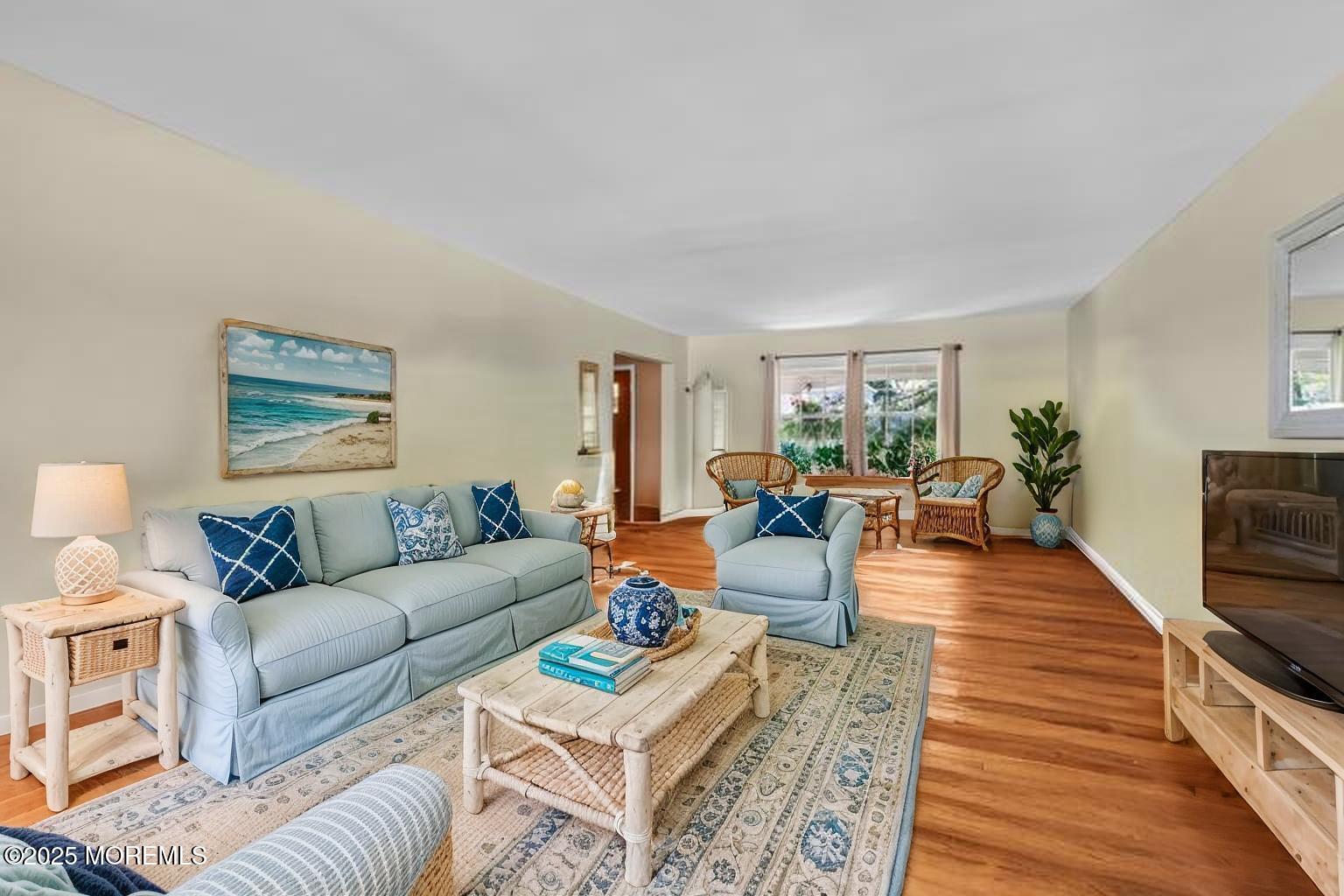 4 Koosman Drive Middletown, NJ 07737 - Photo 6 of 27 a living room with furniture and a wooden floor
