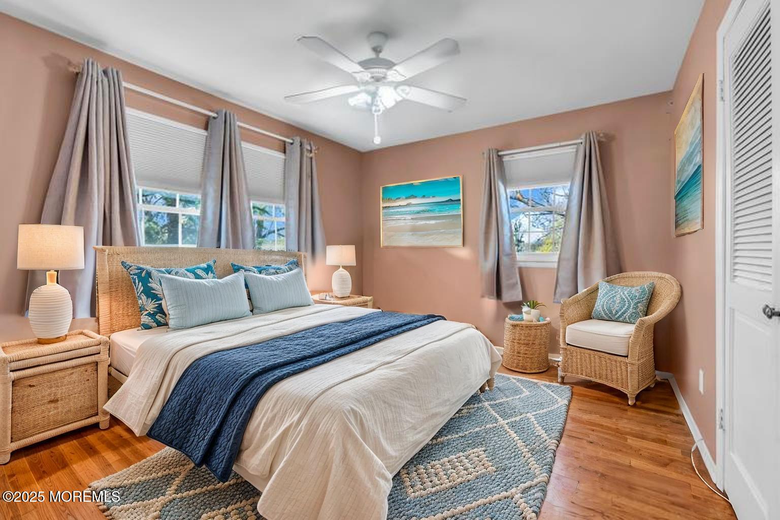 4 Koosman Drive Middletown, NJ 07737 - Photo 9 of 27 a spacious bedroom with a bed and wooden floor