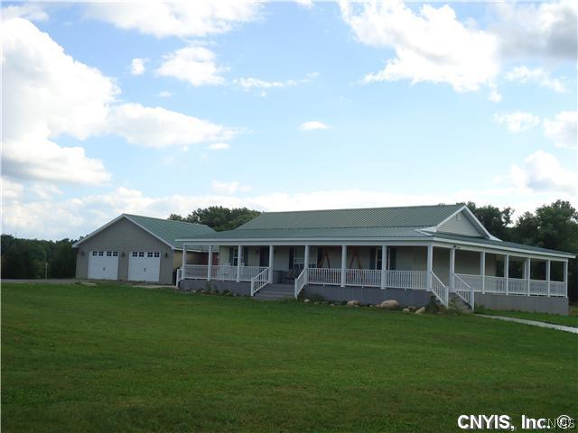 6663 B B Arthur Road, Unit 8 Lowville, NY 13367 - Photo 1 of 1 Exterior Front. Wow...Country living minutes from town! 2 stall attached garage, open floor plan, brand new Horse barn/storage barn, wrap around porch and plenty of land, will make you want to view this lovely move in condition home.