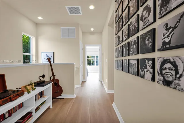 a view of a hallway with workspace