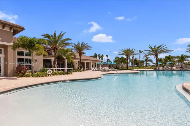 a front view of a house with lake view and lake view