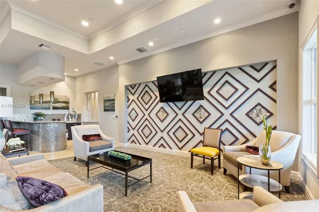 a living room with furniture and a rug