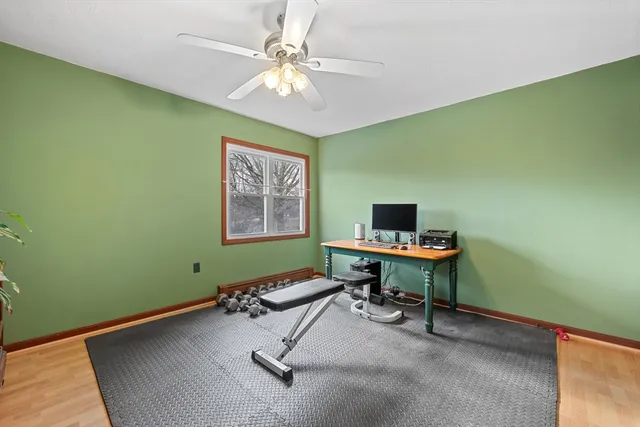 a workspace with a table and a window