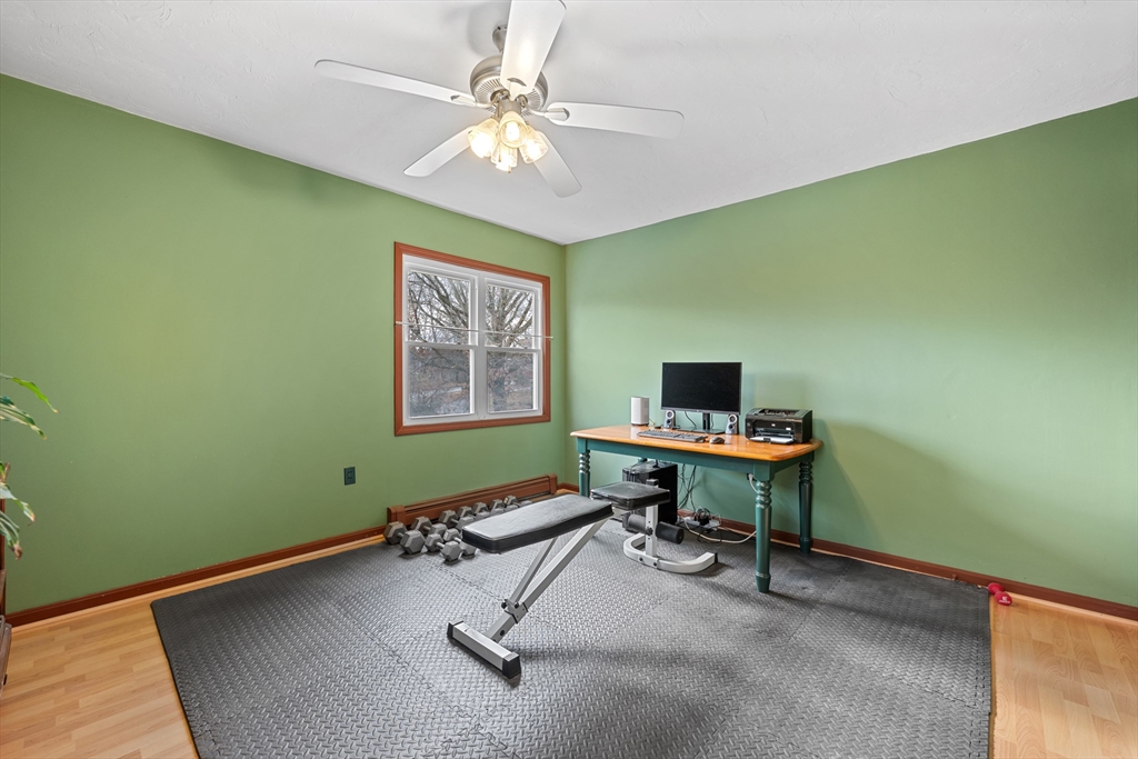 23 Orono Street Worcester, MA 01606 - Photo 18 of 29 a workspace with a table and a window