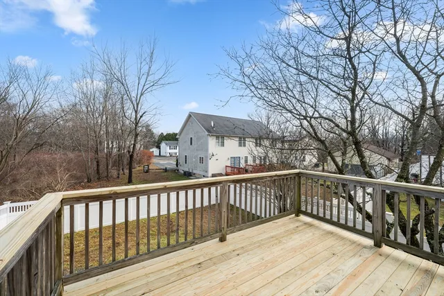 a view of a wooden roof deck