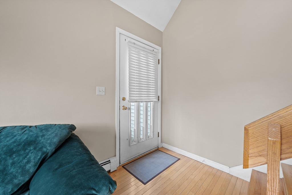 23 Orono Street Worcester, MA 01606 - Photo 4 of 29 a view of an empty room and wooden floor