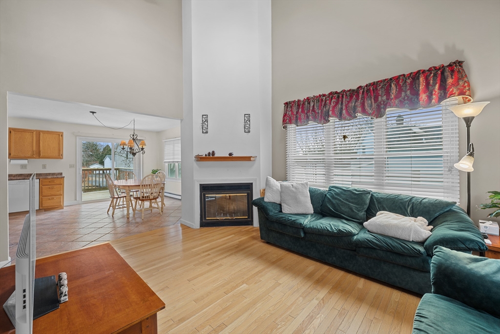 23 Orono Street Worcester, MA 01606 - Photo 5 of 29 a living room with furniture and a fireplace