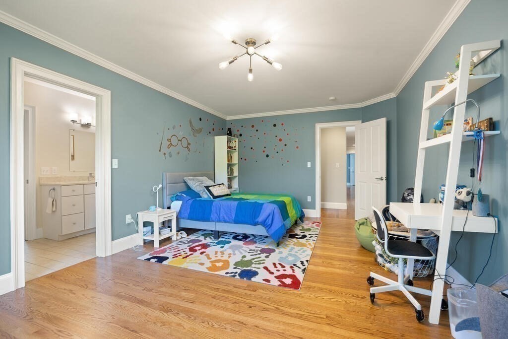 23 Richard Road Lexington, MA 02421 - Photo 20 of 42 a living room with furniture and wooden floor