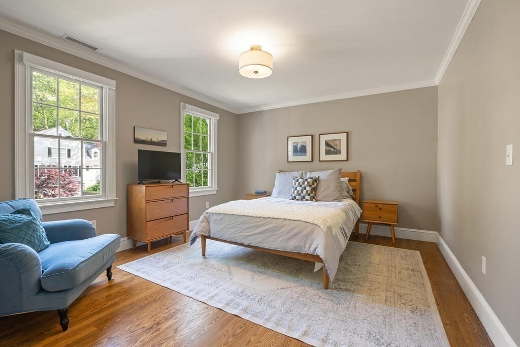 23 Richard Road Lexington, MA 02421 - Photo 24 of 42 a bed room with a bed and a couch