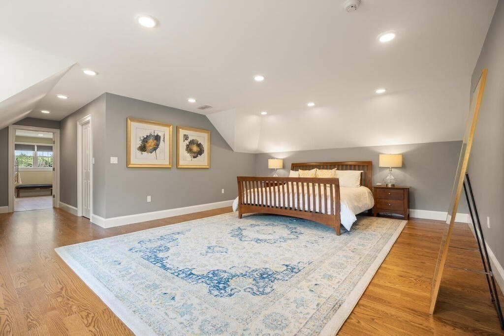 23 Richard Road Lexington, MA 02421 - Photo 26 of 42 a view of a hallway with a bedroom and a couch