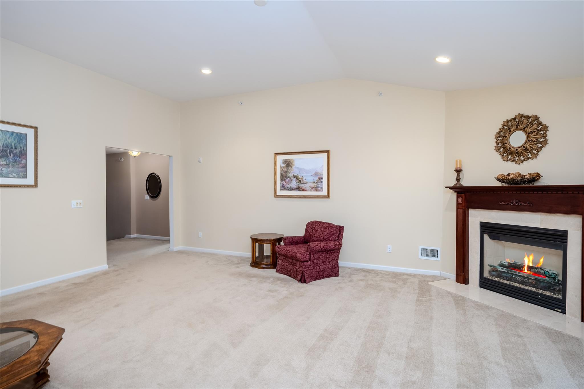 166 Ira Road Mount Sinai, NY 11766 - Photo 12 of 37 a living room with furniture and a fireplace
