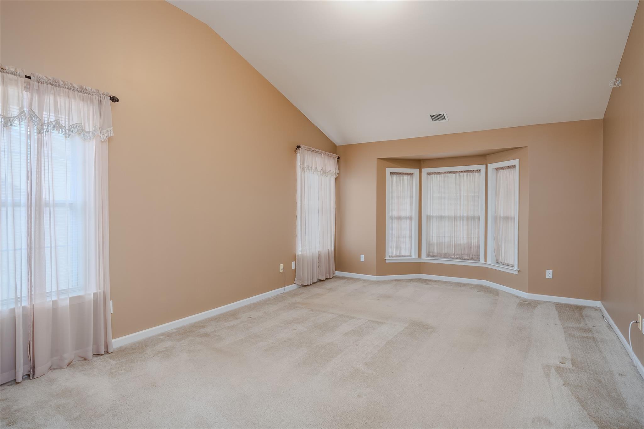 166 Ira Road Mount Sinai, NY 11766 - Photo 16 of 37 a view of an empty room with a window