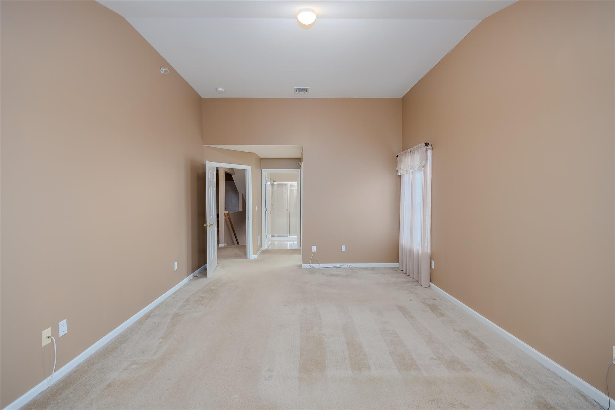 166 Ira Road Mount Sinai, NY 11766 - Photo 17 of 37 a view of an empty room with a window