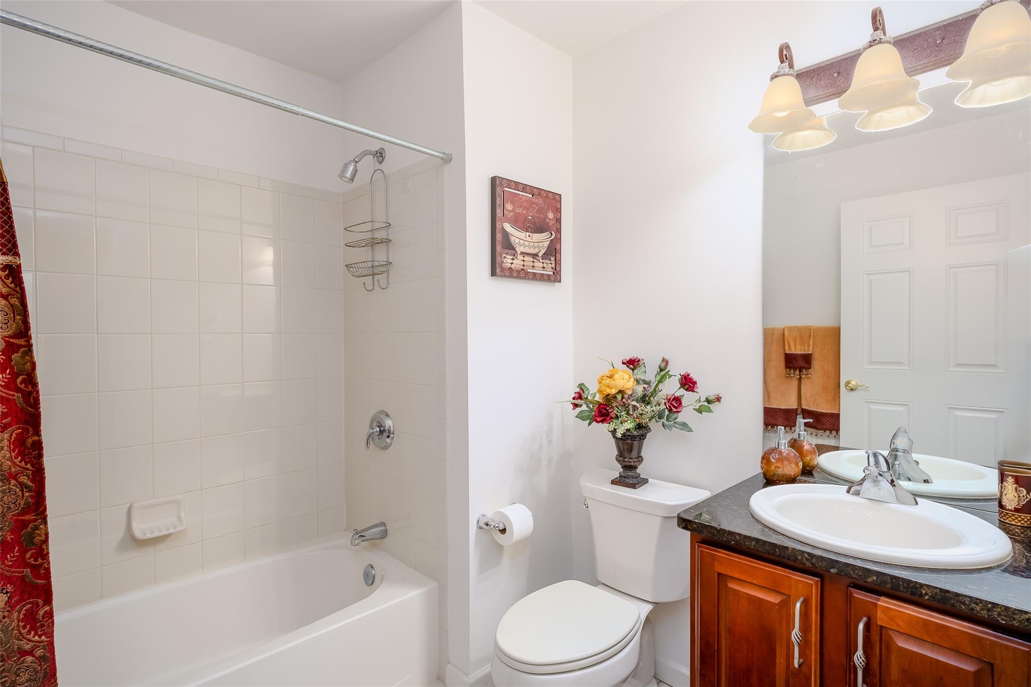 166 Ira Road Mount Sinai, NY 11766 - Photo 18 of 37 a bathroom with a sink vanity mirror and toilet