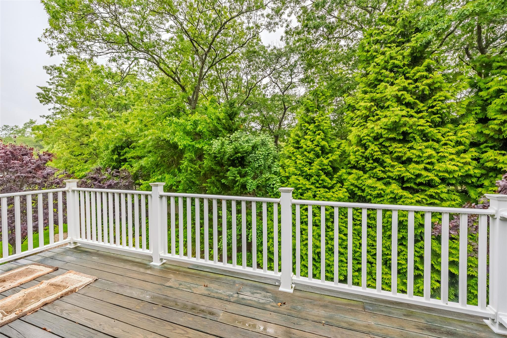 166 Ira Road Mount Sinai, NY 11766 - Photo 24 of 37 a view of balcony with wooden floor