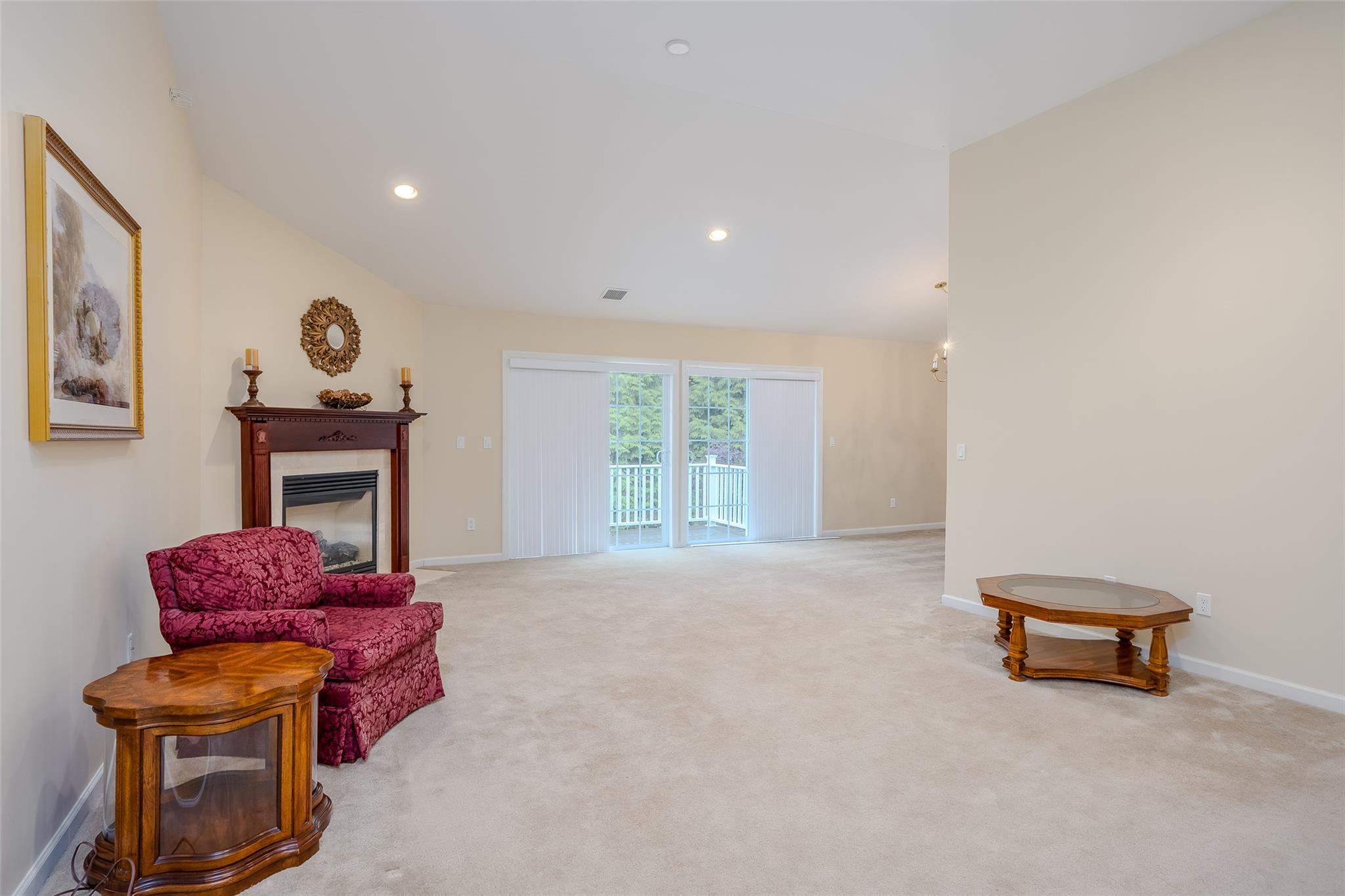 166 Ira Road Mount Sinai, NY 11766 - Photo 7 of 37 a living room with furniture and a window