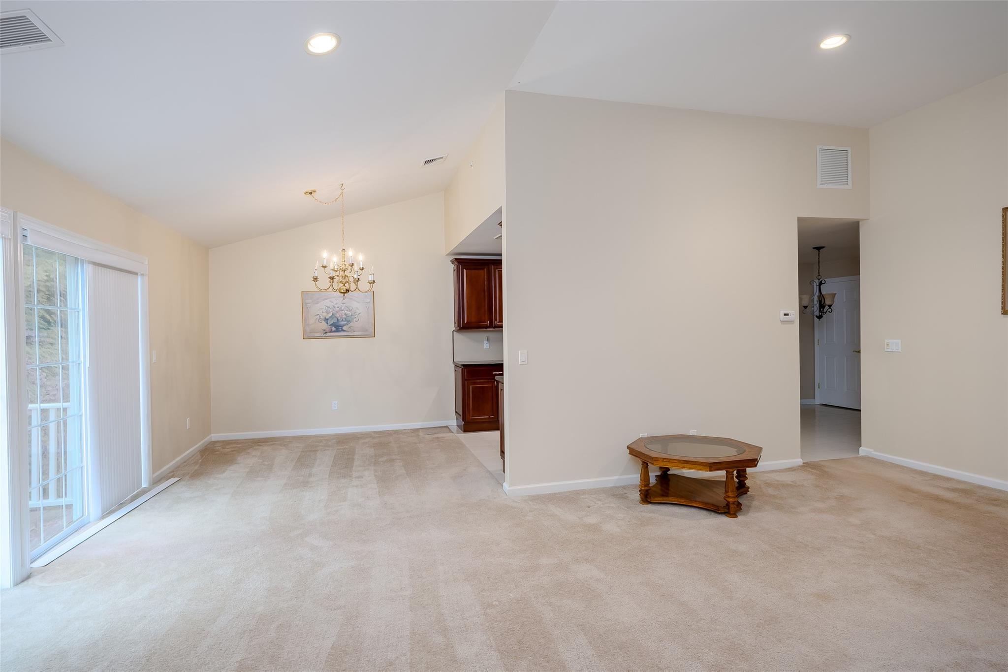 166 Ira Road Mount Sinai, NY 11766 - Photo 8 of 37 an empty room with windows