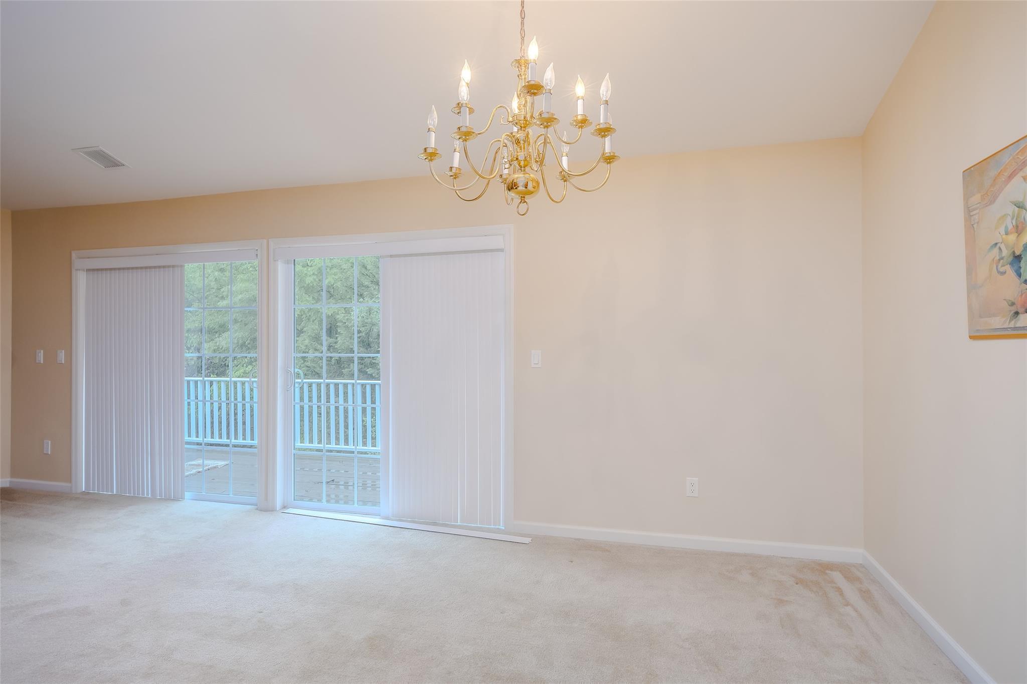 166 Ira Road Mount Sinai, NY 11766 - Photo 9 of 37 a view of an empty room with a window