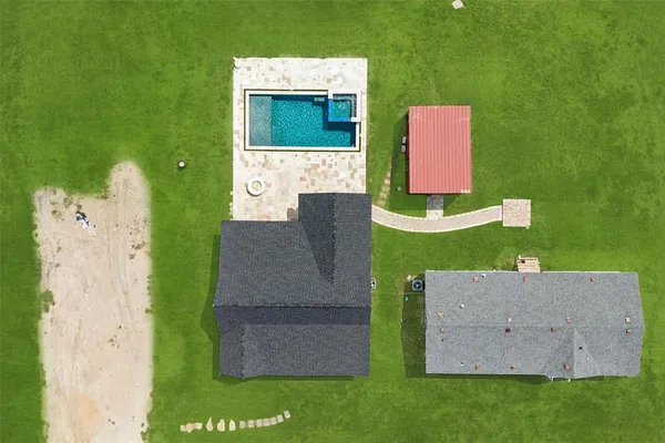 a view of a house with a yard and deck