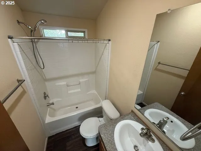 a bathroom with a sink and toilet