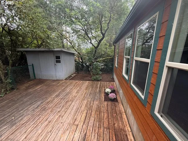 a view of outdoor space with deck and wooden floor