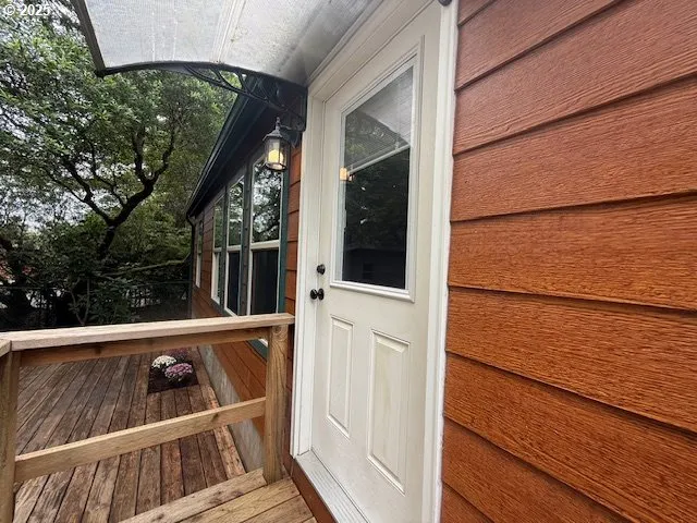 a view of balcony with small garden