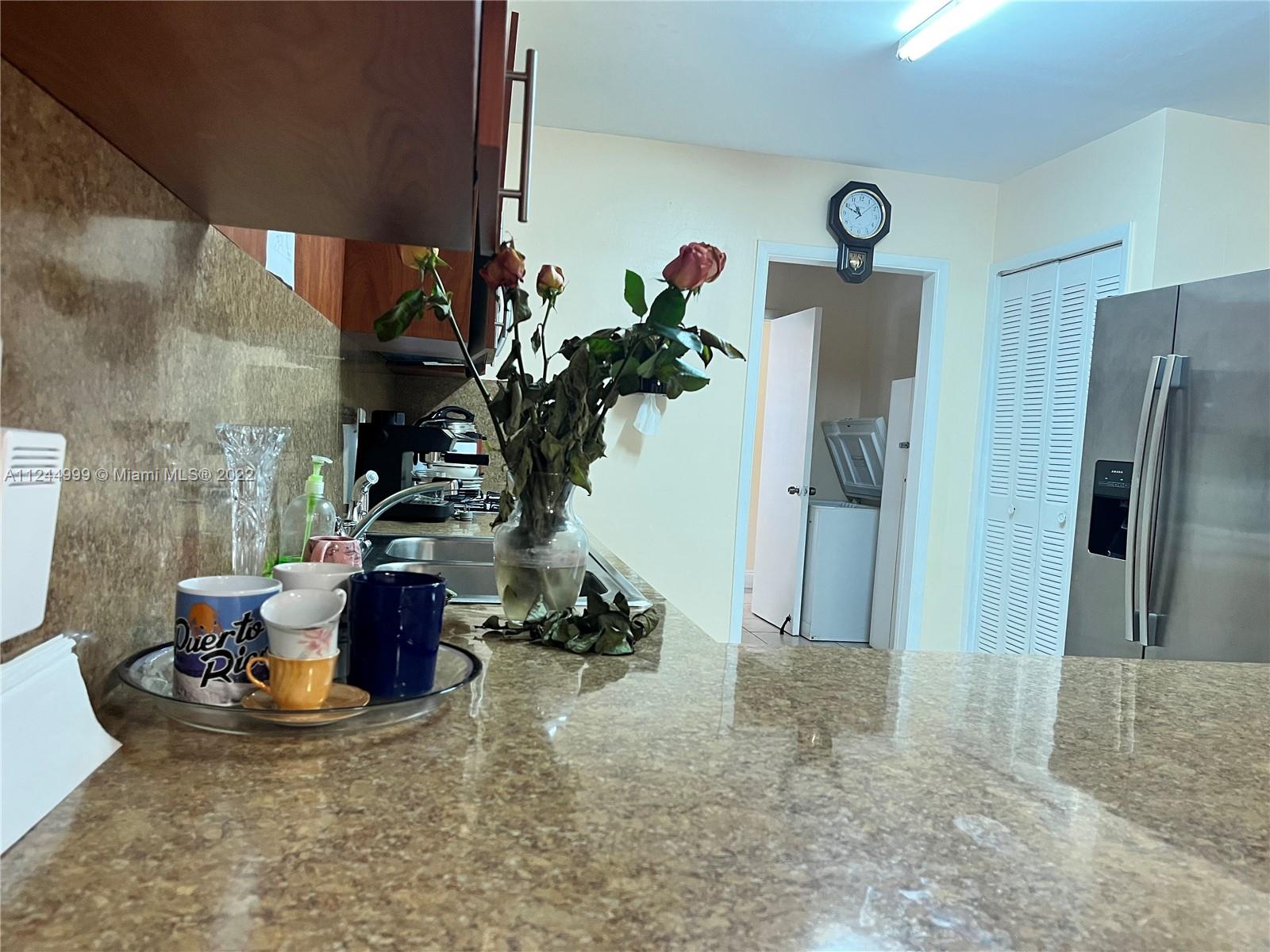 2520 Southwest 102nd Avenue Miami, FL 33165 - Photo 14 of 21 a view of kitchen with furniture and a refrigerator