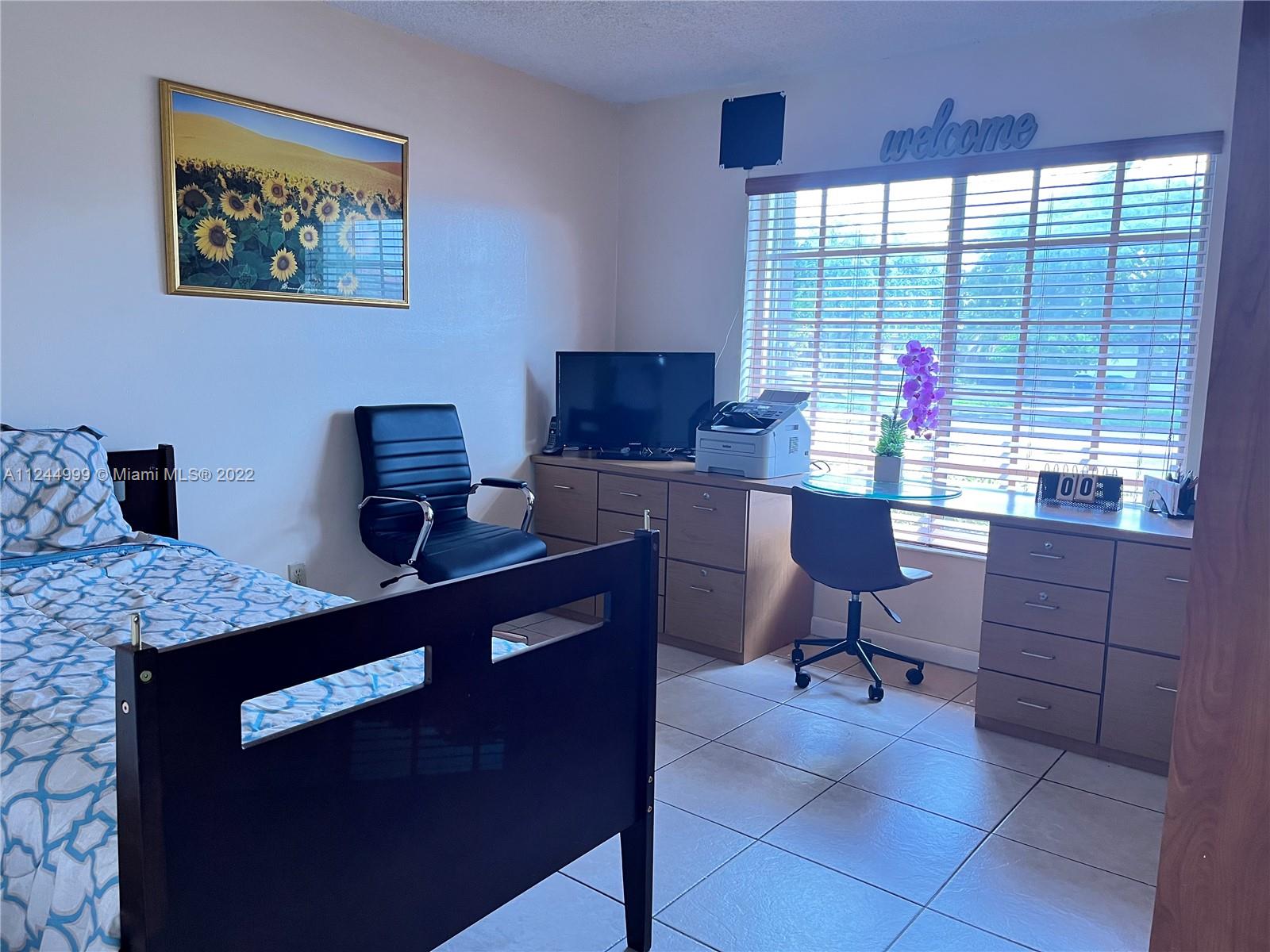 2520 Southwest 102nd Avenue Miami, FL 33165 - Photo 15 of 21 a reading room with furniture and window