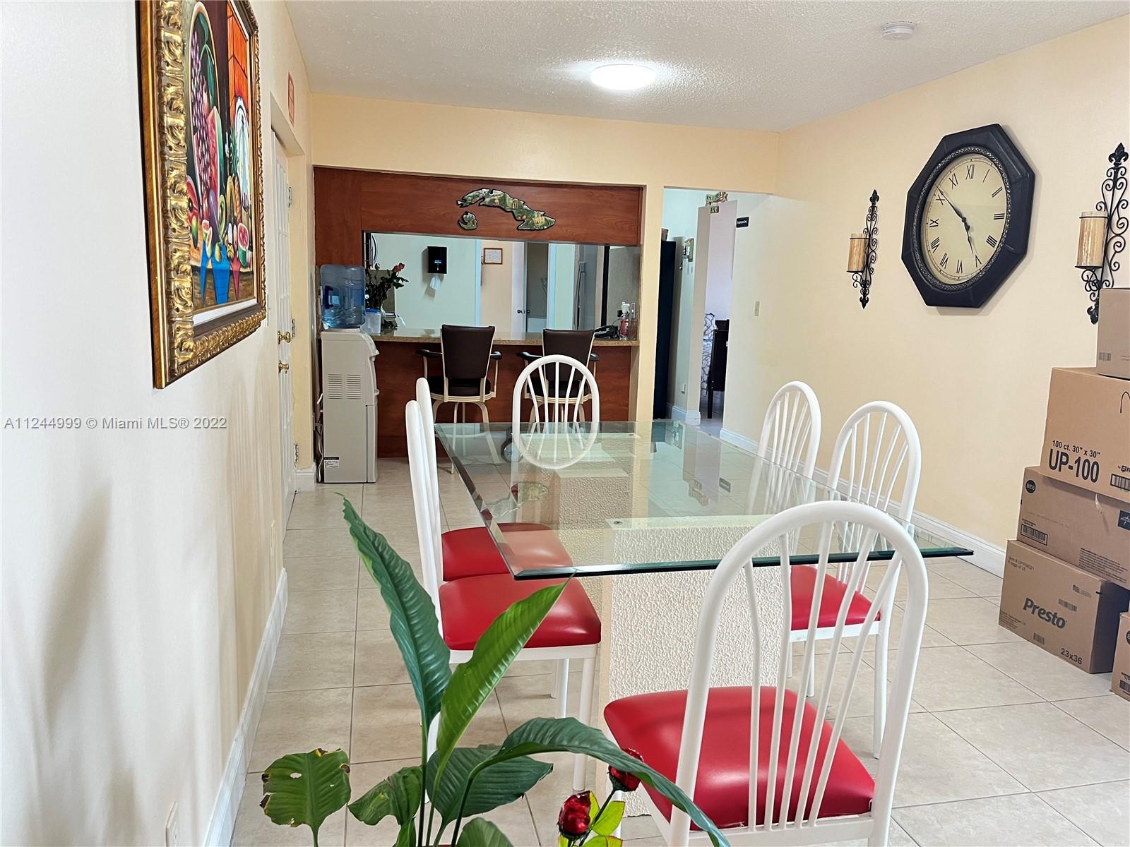 2520 Southwest 102nd Avenue Miami, FL 33165 - Photo 8 of 21 a view of a dining room with furniture