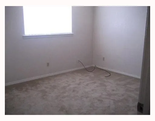 a view of a window in an empty room