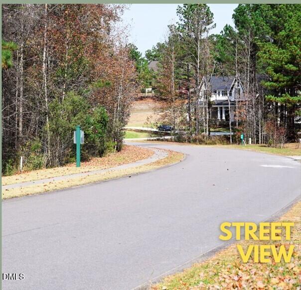 Lot #265 Broken Ridge Trail West End, NC 27376 - Photo 14 of 25 a swimming pool with a building in the background