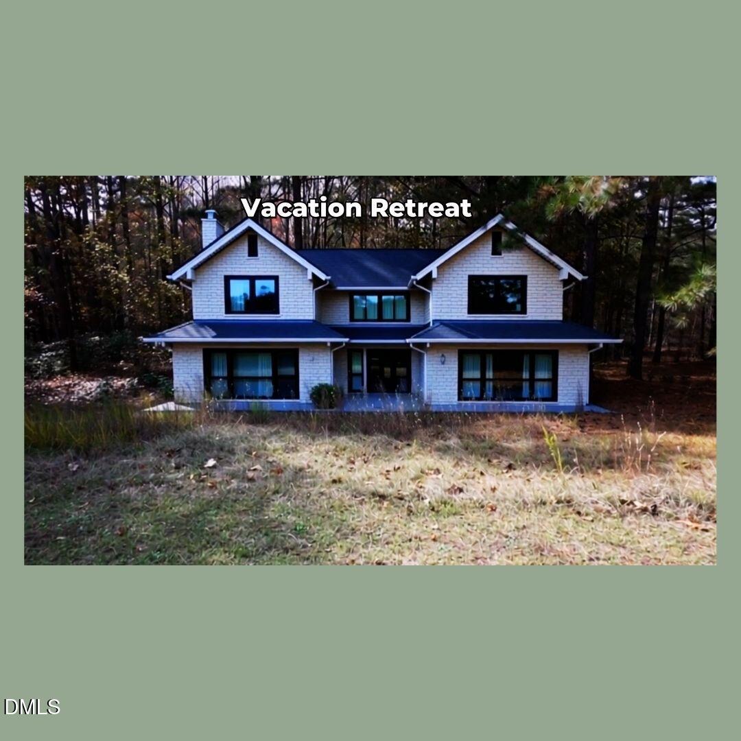 Lot #265 Broken Ridge Trail West End, NC 27376 - Photo 8 of 25 a front view of a house with a yard