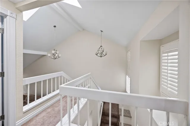 a view of a hallway with windows