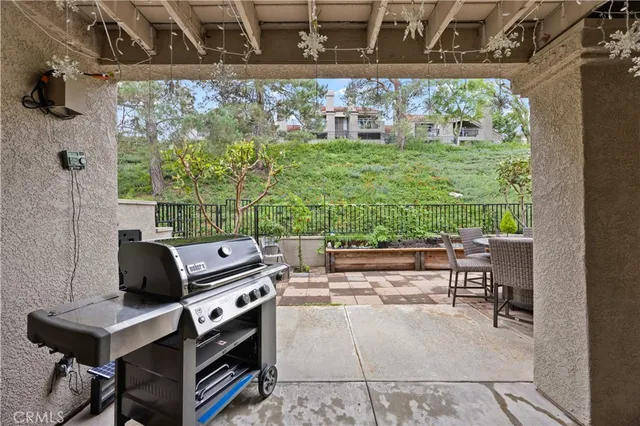 a outdoor dining space with furniture
