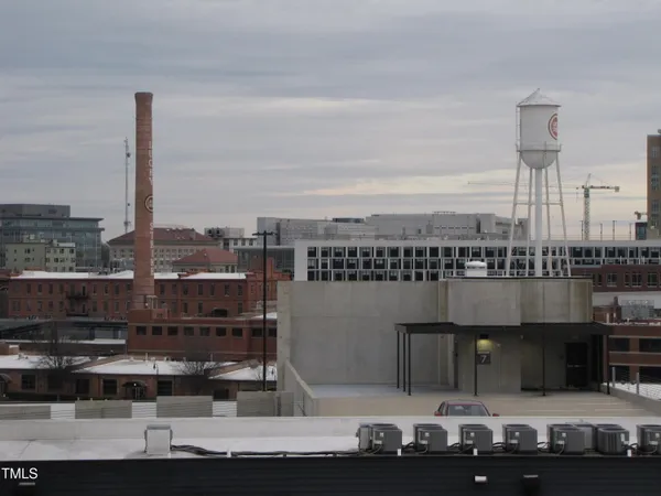 a view of a city with tall buildings