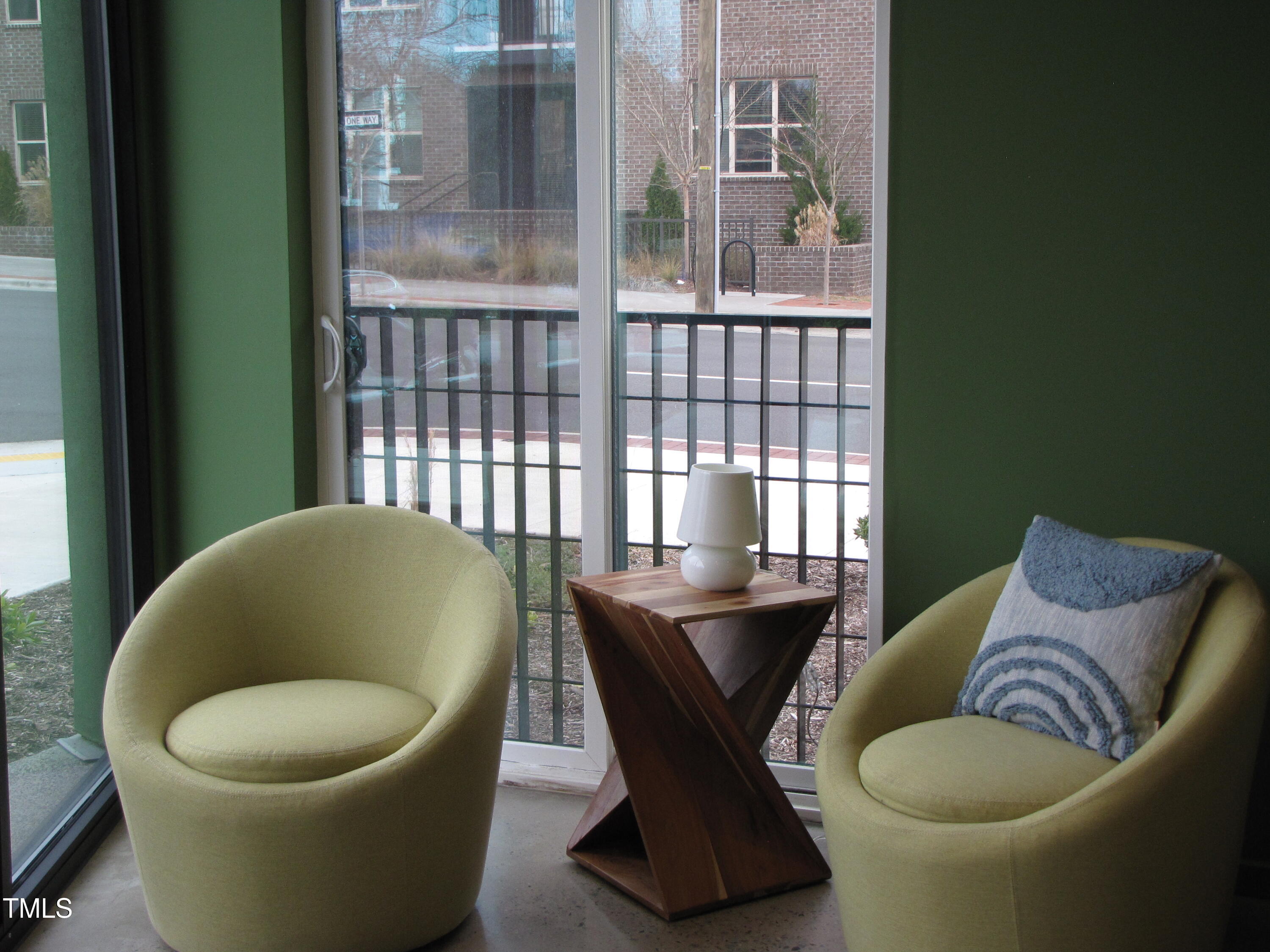 600 South Duke Street, Unit 23 Durham, NC 27701 - Photo 15 of 19 a living room with furniture and a large window