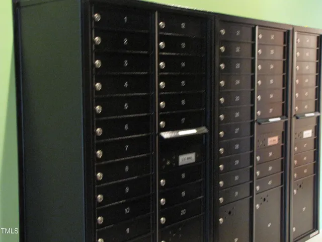 a view of a garage with a bike and car