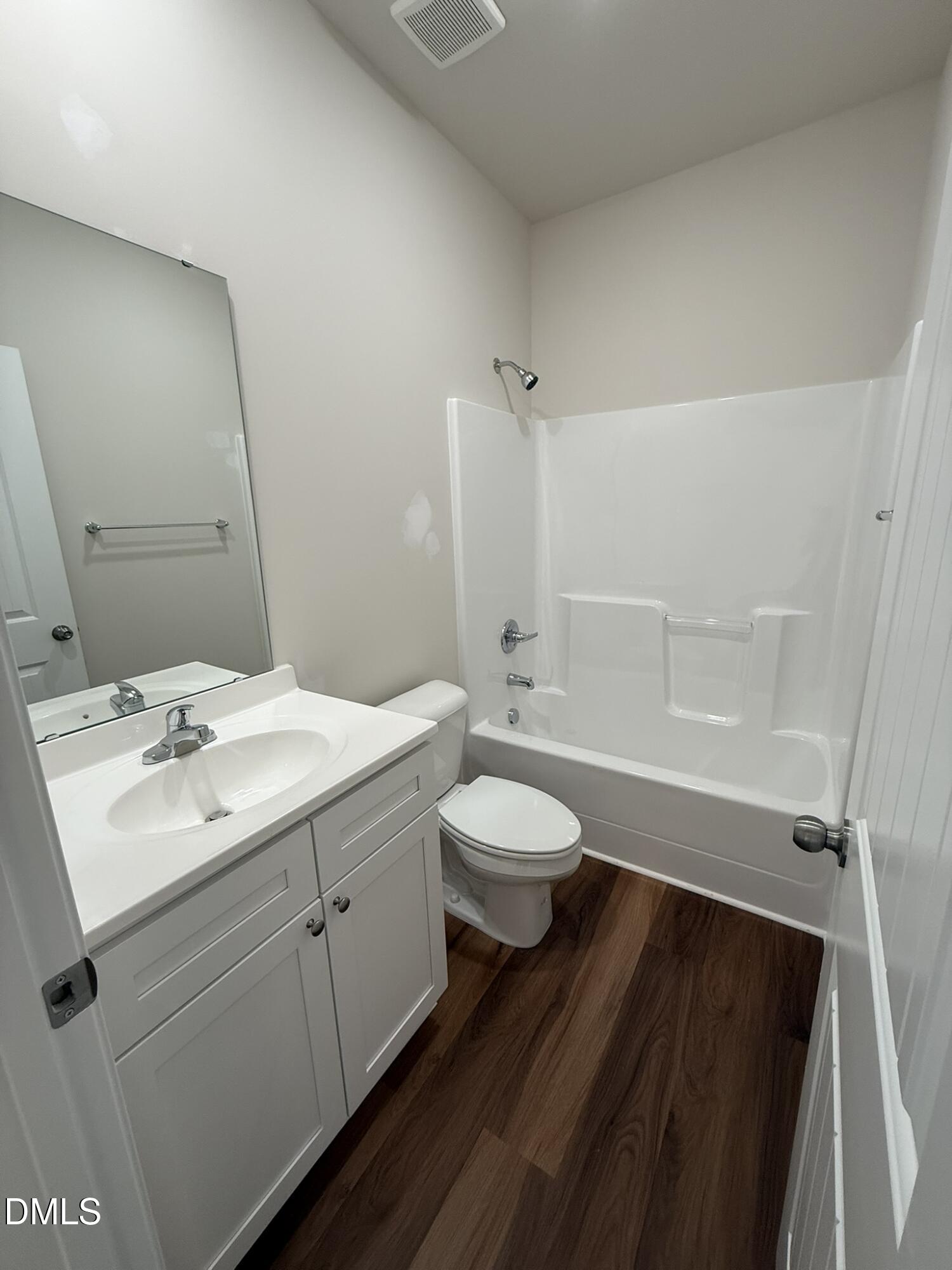 129 Jacobs Ridge Drive Four Oaks, NC 27524 - Photo 16 of 18 a bathroom with a sink toilet and shower