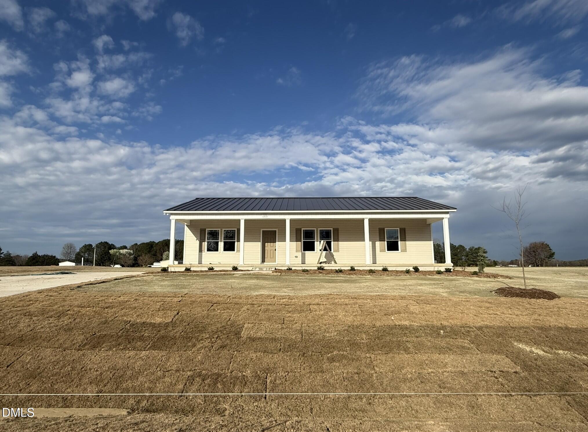 129 Jacobs Ridge Drive Four Oaks, NC 27524 - Photo 4 of 18 a front view of house with yard