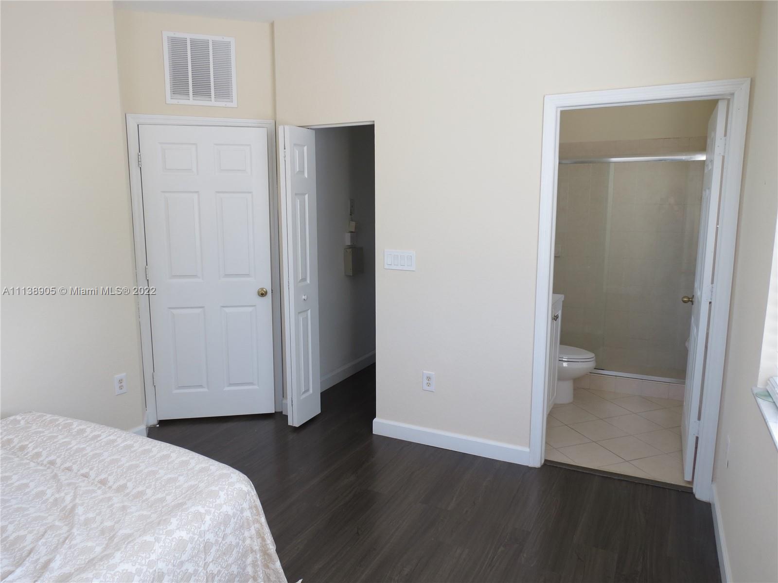 9323 Southwest 227th Street, Unit 75 Cutler Bay, FL 33190 - Photo 30 of 44 a view of bathroom with a toilet