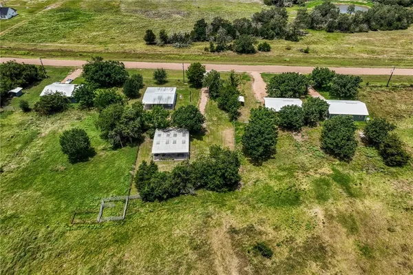 a view of a garden with a lake
