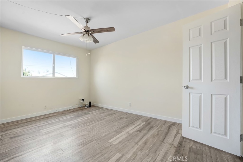 21323 Martin Street Carson, CA 90745 - Photo 19 of 21 a view of an empty room with a window