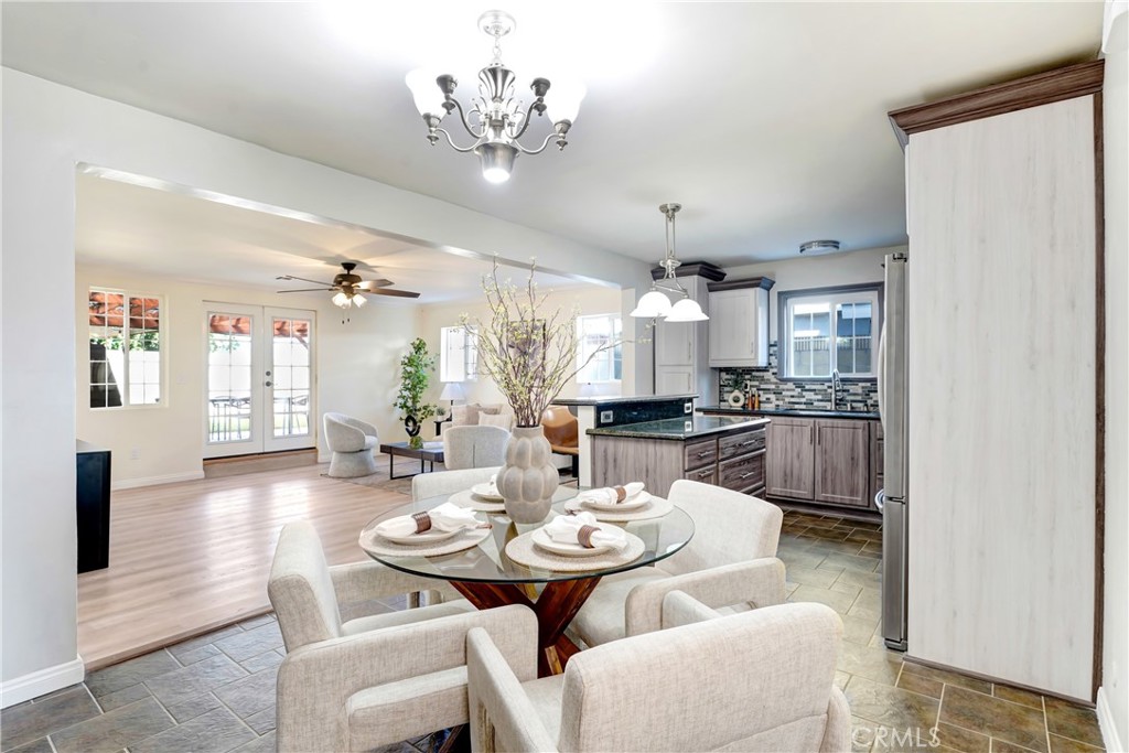 21323 Martin Street Carson, CA 90745 - Photo 4 of 21 a view of a dining room with furniture and wooden floor