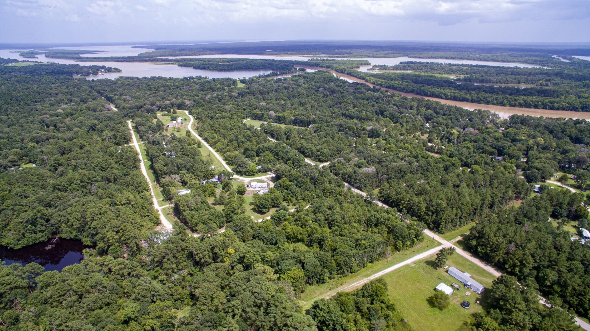 384 Hideaway Drive Trinity, TX 75862 - Photo 5 of 6 an aerial view of a house with a yard