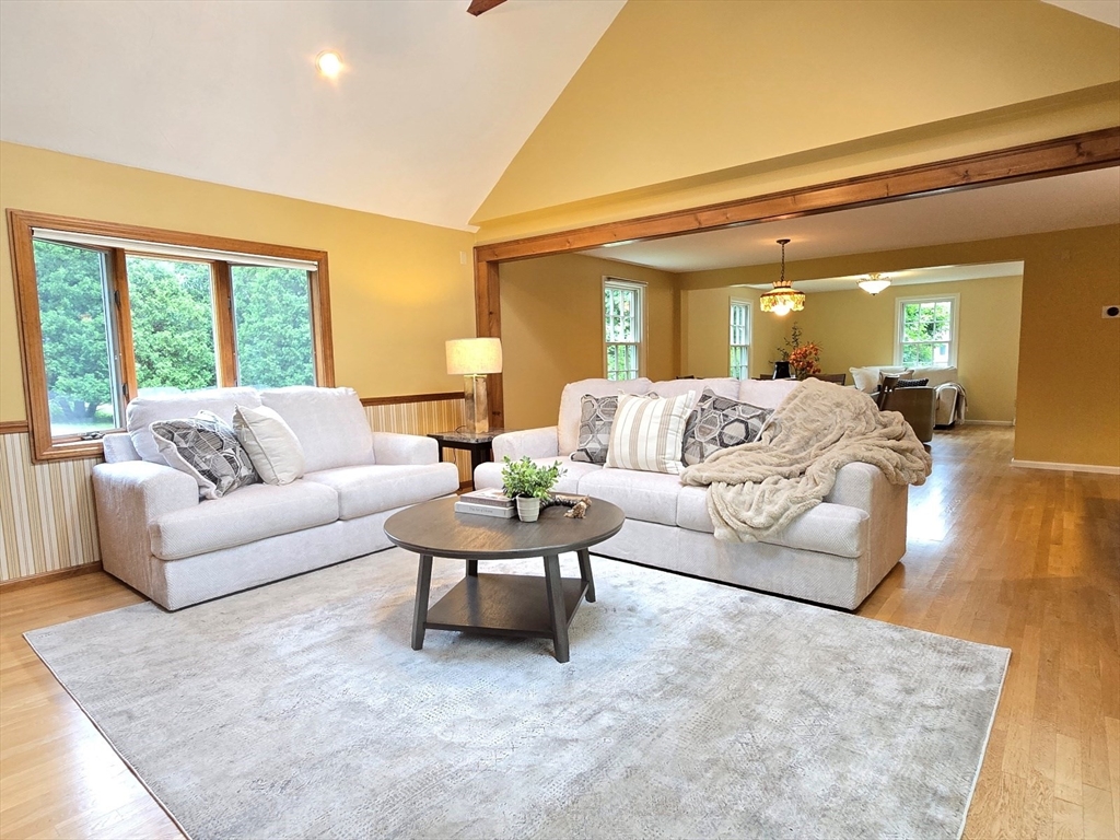 42 Wayside Lane Ashland, MA 01721 - Photo 18 of 40 a living room with furniture and a large window