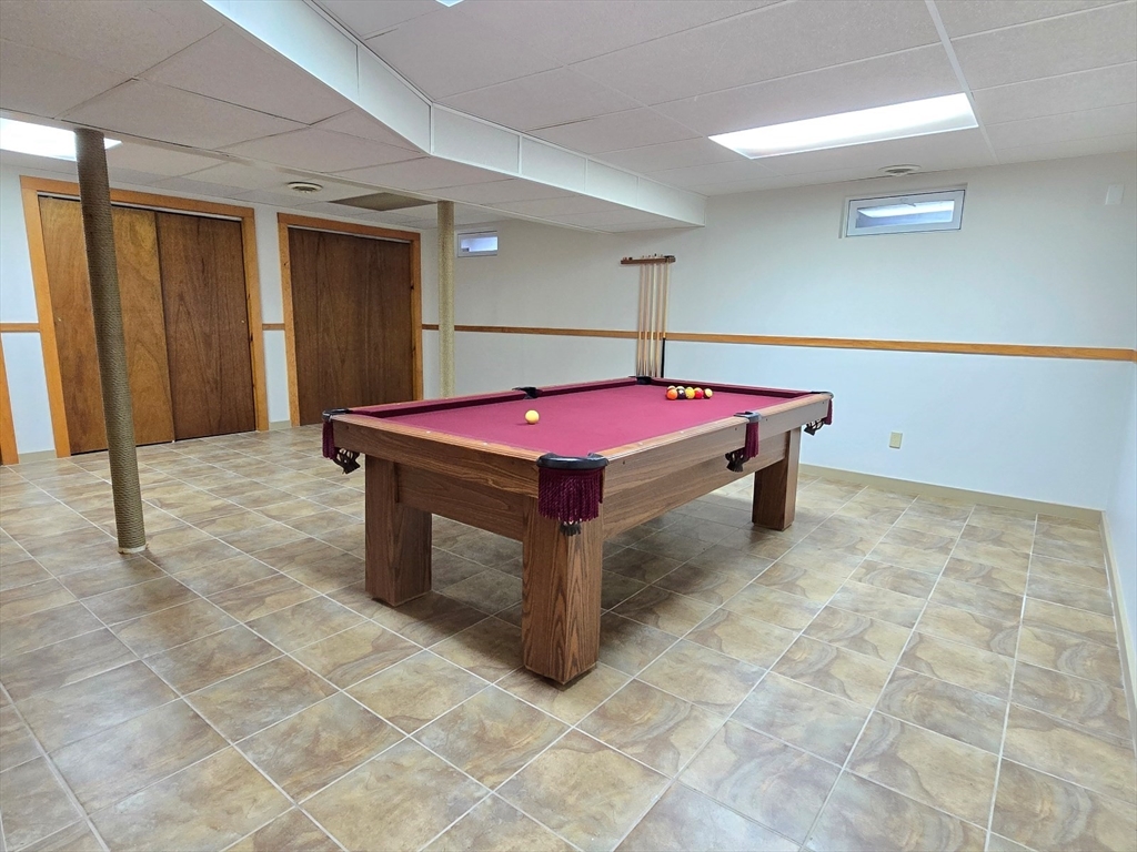 42 Wayside Lane Ashland, MA 01721 - Photo 37 of 40 a room with pool table and wall